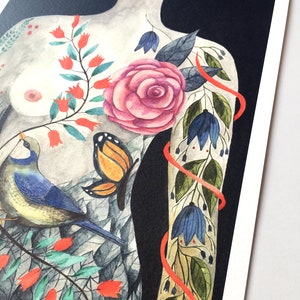 May include: Watercolor painting of a female figure with a floral design on her body. The design includes a pink rose, blue flowers, green leaves, a red ribbon, and a butterfly. A blue bird is perched on a branch of the design.