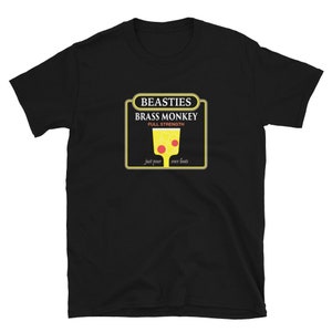 May include: Black t-shirt with a yellow and red graphic of a beer glass with the text "Beasties Brass Monkey Full Strength Just pour over beats"