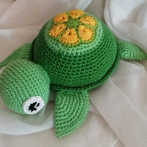 Niedliche Schildkröte zum Kuscheln, Spielen und lieb haben Grün African flower