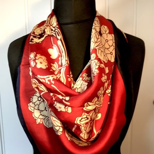 Gorgeous soft silk floral scarf. Burgundy background with cream detail and navy edging. Mother's Day personalised gift box available.