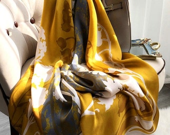 Luxurious soft silk scarf. Vibrant gold and blue/grey floral design.Personalised gift/Xmas box available. Great Mother's Day gift!