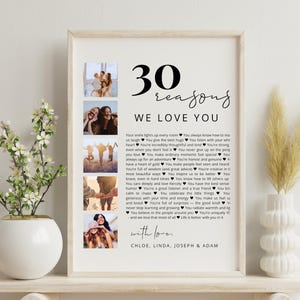 May include: A framed print with the text "30 reasons we love you" and photos. The print includes a list of reasons and the names Chloe, Linda, Joseph & Adam. The frame is light-colored.