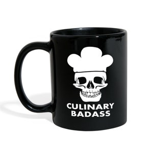 May include: Black ceramic mug featuring a white skull wearing a chef's hat. The text "CULINARY BADASS" is printed below the skull. The mug has a curved handle and a glossy finish.