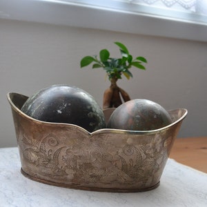 Silver Plated Chiseled Object Holder Vintage planter vase with decorative orbs arms design.