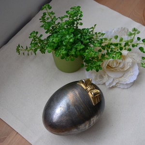 Gold bow large egg box metal box.