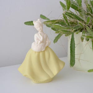Vintage Avon Moonwind perfume bottle girl flower basket | Yellow collectible eau de cologne