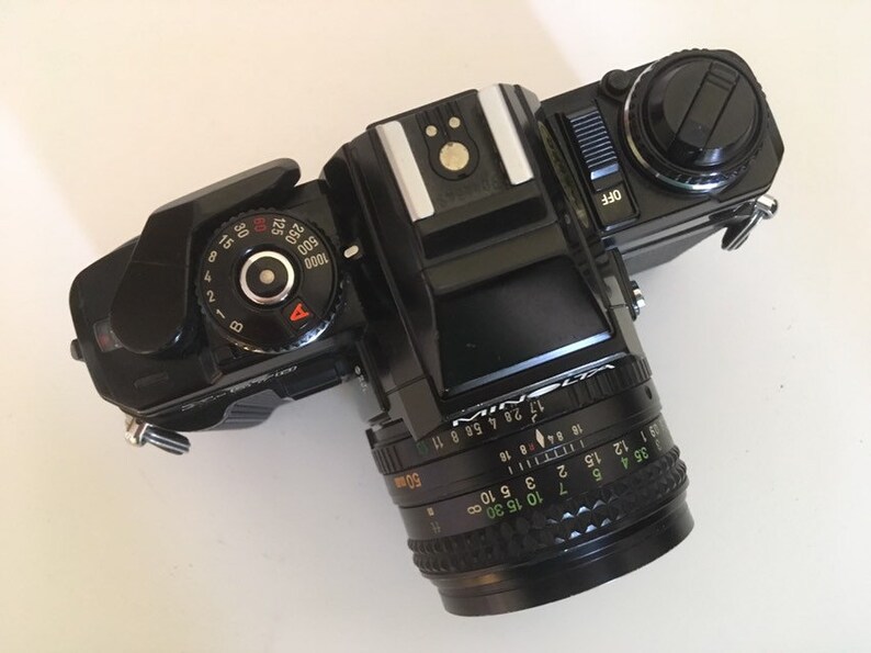 Minolta X-570 with 50mm lens