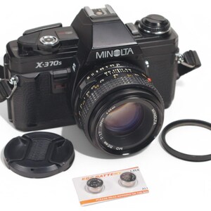 Minolta X-370S with 50mm prime lens.