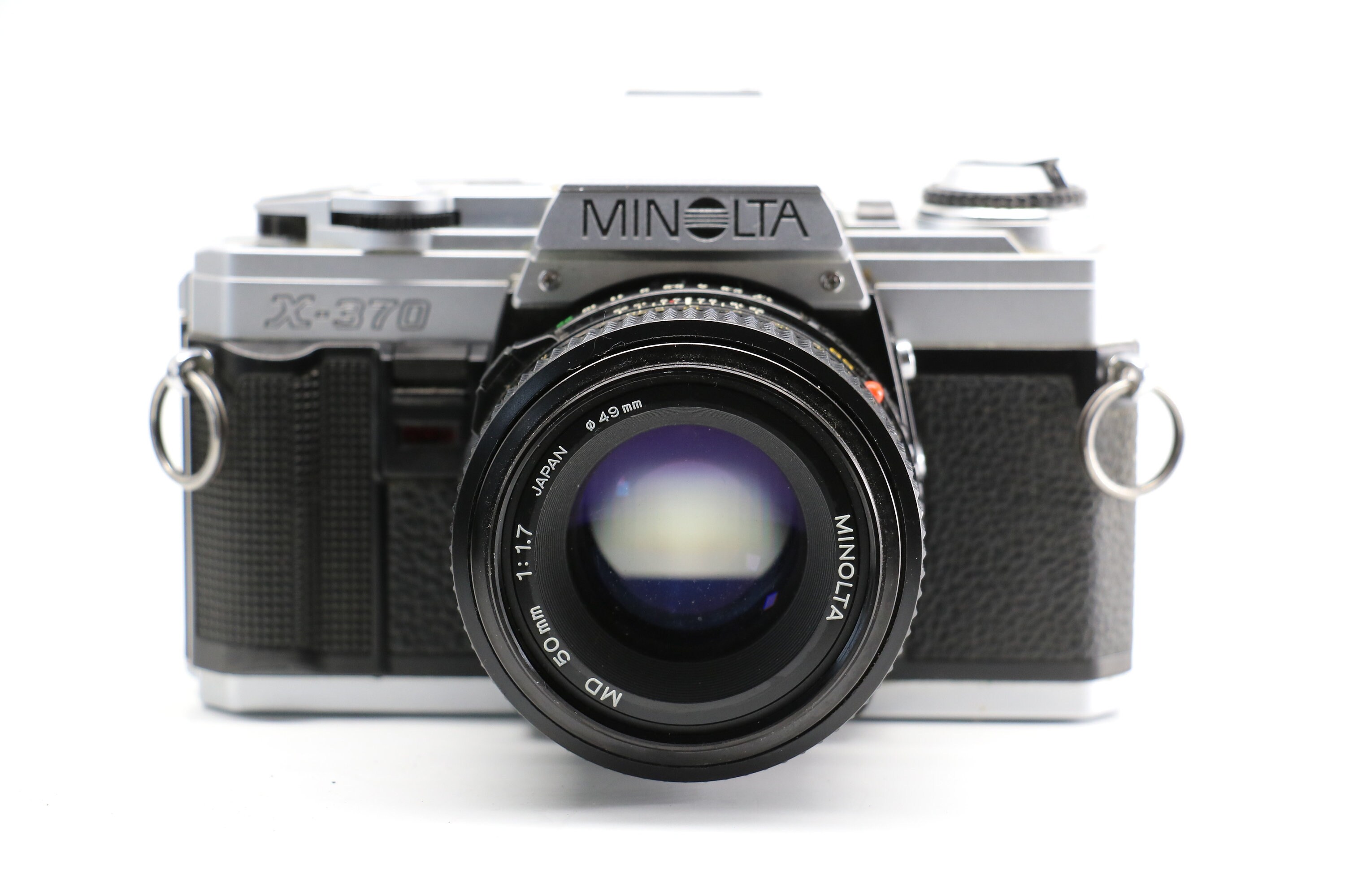 Minolta X370 with 50mm f/1.7 lens & 2870mm lens. Flash Etsy