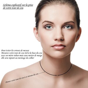May include: Diagram showing how to measure your neck for a necklace. The image shows a woman's neck with a black line indicating where to measure. The text reads: "Sch&eacute;ma explicatif sur la prise de votre tour de cou Pour &eacute;viter les erreurs de mesure Mesurez votre tour de cou r&eacute;el &agrave; la base du cou avec un m&egrave;tre ruban mais sans mettre de marge elle sera rajout&eacute; au montage du collier Prenez votre tour de cou &agrave; ce niveau du cou"