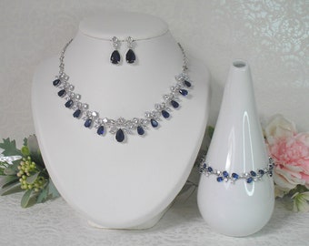 Parure mariage Collier bracelet et boucles d'oreilles argenté strass cristal et bleu saphir