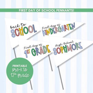 May include: Four white triangular pennants on thin sticks featuring colorful text. The pennants read back to SCHOOL, First day of KINDERGARTEN, First day of 1st GRADE, and High School SOPHMORE. A green circle includes the text PRINTABLE pre-K to 12th grade.