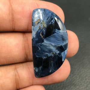 Pietersita Cabujón... Cabujón de forma libre... 33x17x6mm... 25Cts...#H3190