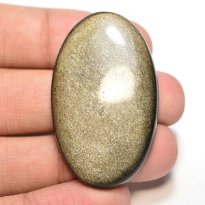 Cabochon di ossidiana dorata...Cabochon ovale...42x26x7mm...52ct...#i4055
