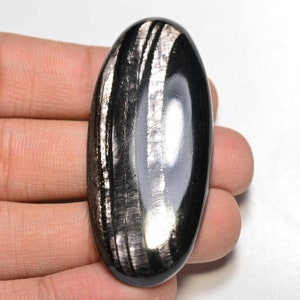 Cabochão de hiperstênio...Cabochão oval...55x24x6mm...93Cts...#i6854