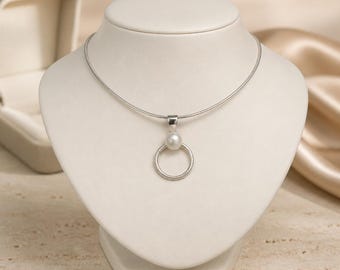 Sterling silver pendant with freshwater pearl and sterling silver choker.