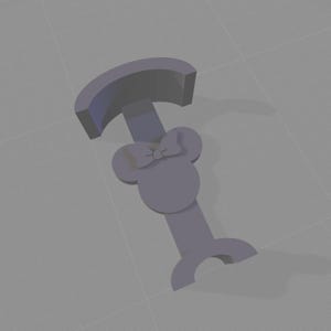 Op de afbeelding: Een grijze, 3D-geprinte telefoonstandaard met Minnie Mouse-thema. De standaard heeft een strik en het iconische muissilhouet. De basis heeft een gebogen ontwerp voor stabiliteit en de bovenkant heeft een gebogen gedeelte om een telefoon vast te houden.