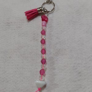 Keychains, pink keychains, pink beads, pink tassels, clip on keychains, backpack keychains, beaded keychains, beads, clear beads, hot pink