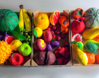 Basket of fruits hand made from tissu paper.