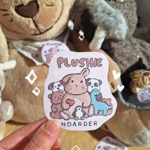 Plushie Hoarder vinyl sticker | adorable stuffed animal collector art, cute bunny illustration with teddy bear, dinosaur, dog, penguin, cat