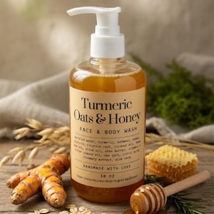 May include: A bottle of Turmeric Oats & Honey Face & Body Wash with a white pump. The label lists ingredients including turmeric, oatmeal, and honey. The image includes turmeric roots, oats, honeycomb, and a honey dipper.