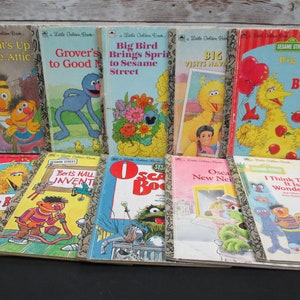 May include: A collection of ten vintage Sesame Street Little Golden Books. The books feature Big Bird, Elmo, Oscar the Grouch, Bert and Ernie, and other Sesame Street characters. The books are in good condition with some wear and tear.