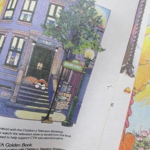 May include: An illustration of a purple building with a brown door and a sign that reads "Sesame Street". There is a tree in front of the building and a sign that says "Do Not Disturb".