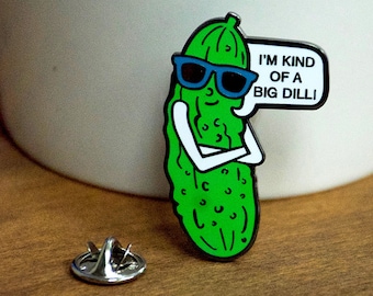 May include: A green pickle wearing sunglasses and a speech bubble that says "I'm kind of a big dill!" Enamel pin.
