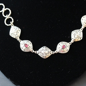 Sterling Silver filigree link and Ruby adjustable bracelet