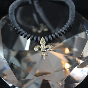 14kwg diamanten Fleur de Lis zwarte onyx ketting