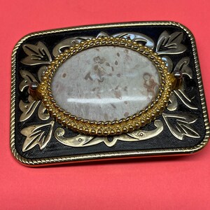 Estate find gold tone with black distress petrified palmwood belt buckle