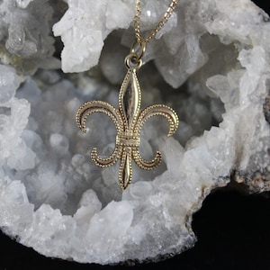 14k yellow gold millgrain edged Fleur de Lis necklace