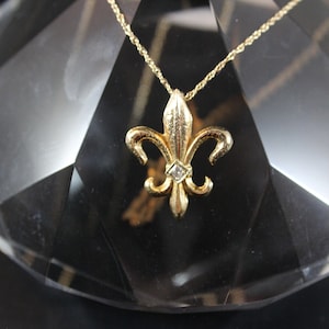 14k yellow gold diamond Fleur de Lis necklace