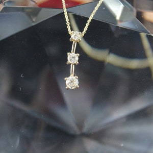 14k yellow gold 1/2 ctw. diamond 3 stone pendant necklace