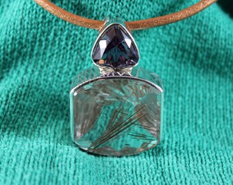 Handgemaakte sterlingzilveren ring met amethist en rutielkwartsketting