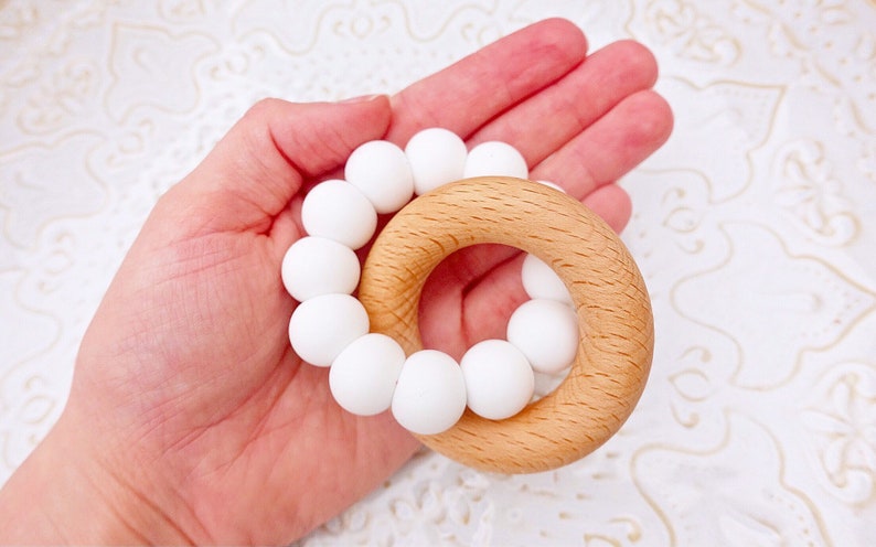 egg teether with handle