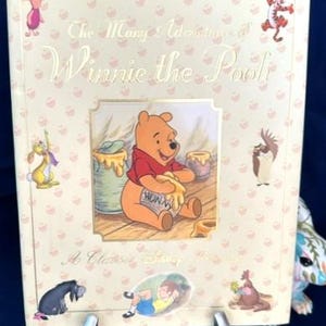 The Many Wonders of Winnie the Pooh, 1997, Hardcover with dust cover. excellent condition, pages are clean and crisp