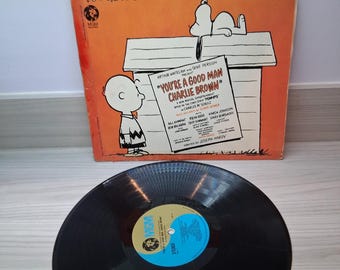Álbum de vinilo LP de 33 "You're A Good Man Charlie Brown" Álbum del elenco original "Speanuts" vinilo en condiciones como nuevas. z