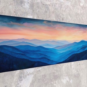 A painting of a mountain range with a vibrant sunset sky in the background.