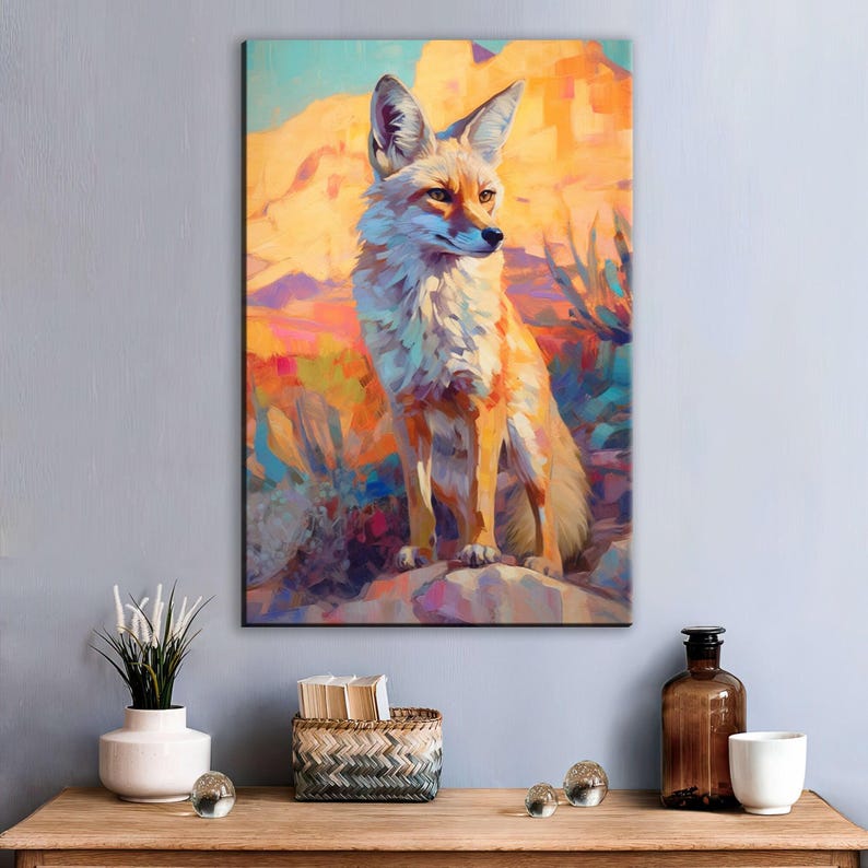 a vibrant painting of a fox, which is hanging on a wall above a wooden table. The painting is surrounded by various decorative items, including a vase with white flowers, a woven basket, and a bottle.