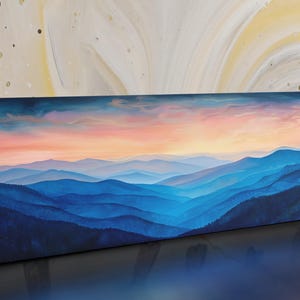 The image is a painting depicting a beautiful mountain landscape with a vibrant sunset over the rolling hills.