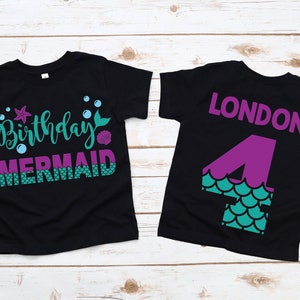 May include: Black t-shirt with a mermaid design and the text "Birthday Mermaid". The back of the shirt has a purple number 4 with a mermaid tail design and the name "LONDON" in purple text.