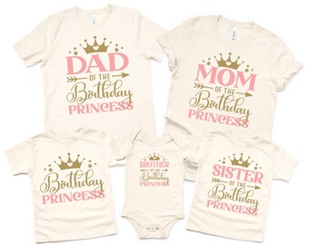 May include: A collection of cream-colored t-shirts and a onesie with pink and gold text. The shirts read "Dad of the Birthday Princess," "Mom of the Birthday Princess," "Birthday Princess," "Brother of the Birthday Princess," and "Sister of the Birthday Princess."