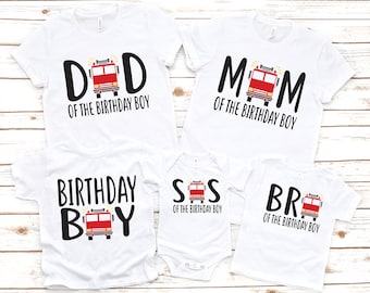 May include: Set of four white t-shirts with black text and a red fire engine graphic. The shirts say "Dad of the Birthday Boy", "Mum of the Birthday Boy", "Birthday Boy", and "Sis of the Birthday Boy".