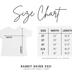May include: Size chart for toddler t-shirts, showing width and length measurements in inches for sizes 2T, 3T, 4T, 5/6, and 7. The chart is labeled "Rabbit Skins 3321 Toddler Fine Jersey T-Shirt."