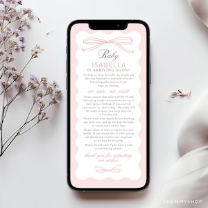 May include: A digital invitation on a smartphone screen, featuring a pink and white design with the text "Baby ISABELLA IS ARRIVING SOON!". The invitation includes visiting guidelines and a bow graphic. The phone is on a white surface with floral accents.