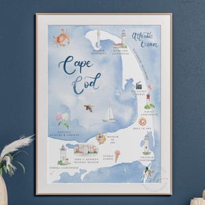 May include: Watercolor map print of Cape Cod, featuring landmarks like lighthouses, museums, and the Atlantic Ocean. The map is in shades of blue and white, with hand-drawn illustrations and the words "Cape Cod" in elegant script.