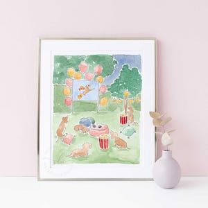 May include: Watercolour print depicting a dog party. The illustration shows dachshunds at a picnic with popcorn, balloons, and a movie screen. The colour scheme includes greens, pinks, yellows, and blues, creating a joyful scene.