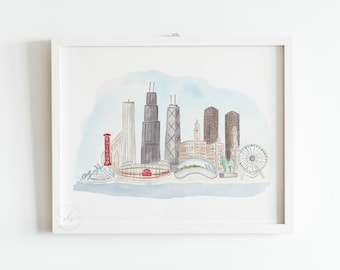 May include: Watercolor print of the Chicago skyline, featuring iconic buildings, a Ferris wheel, and the Cloud Gate sculpture. The word "CHICAGO" is displayed in red. The artwork is framed in a white square frame.