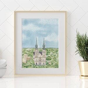 May include: Watercolor painting of a white church with two tall green spires, surrounded by green trees and a blue sky with white clouds.